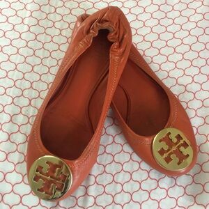 Tory Burch Orange Flats with Gold Emblem